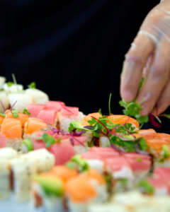 chef sprinkling micro cilantro